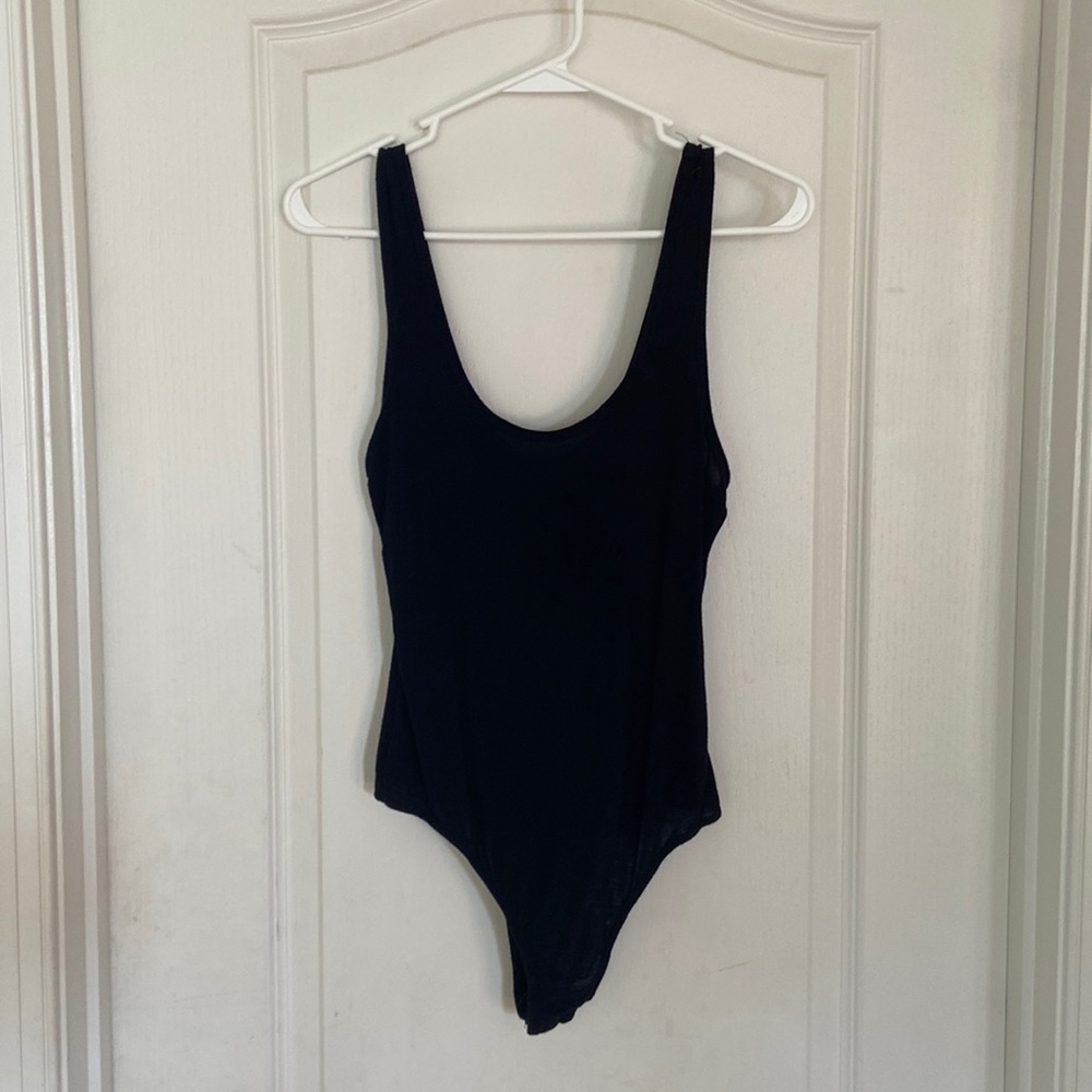 3 Mike & Joey Body Suits. Black, dark green, burnt orange/ tan.